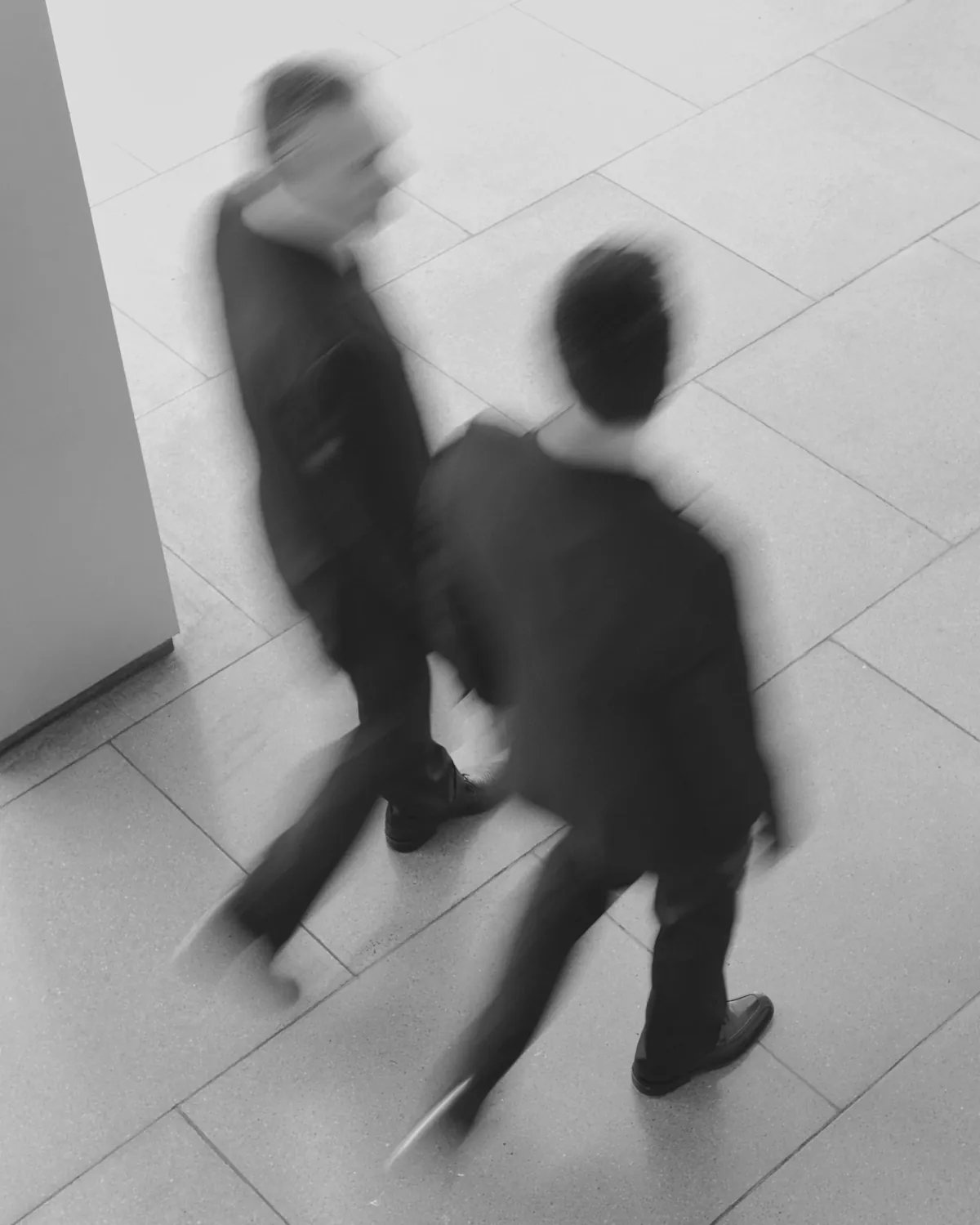 Two professionals in motion, seen from above